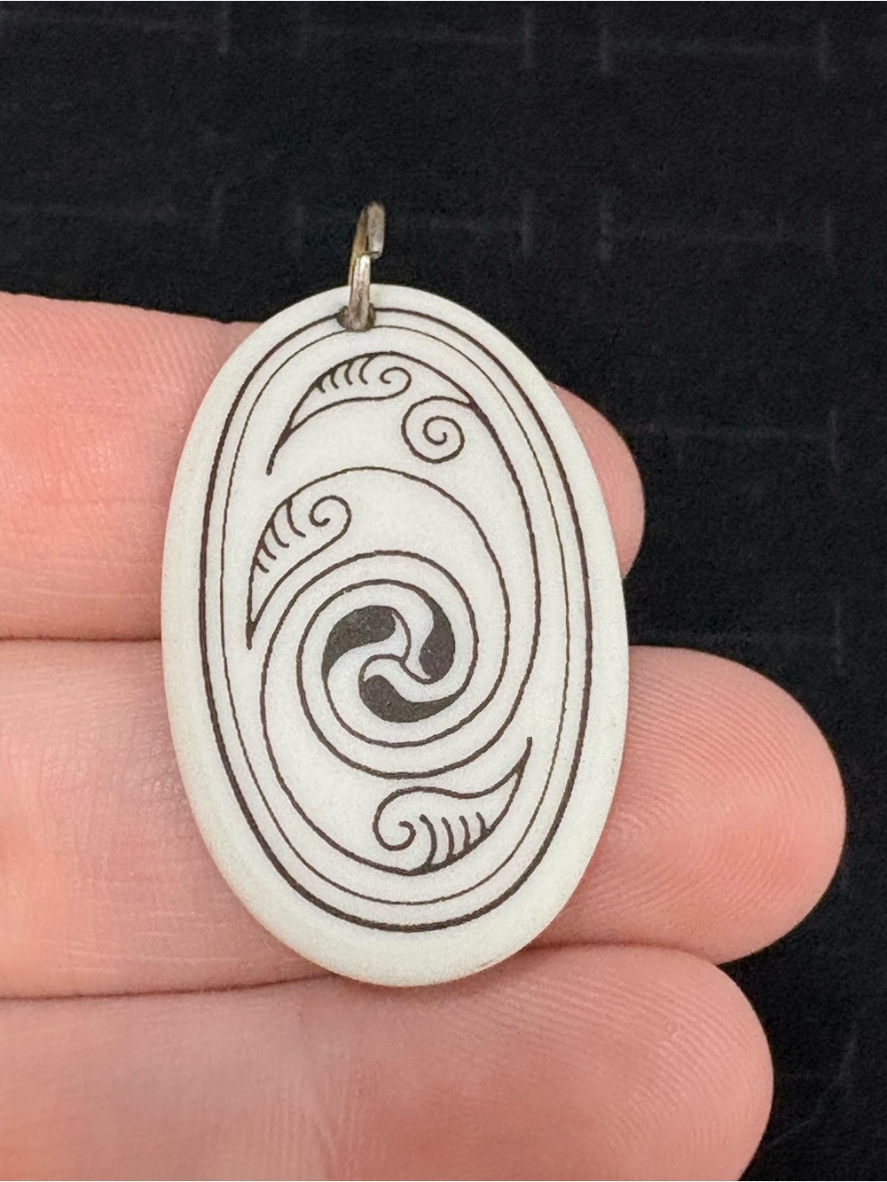 Carved White Oval Pendant Necklace with Swirl Motif soft and feminine